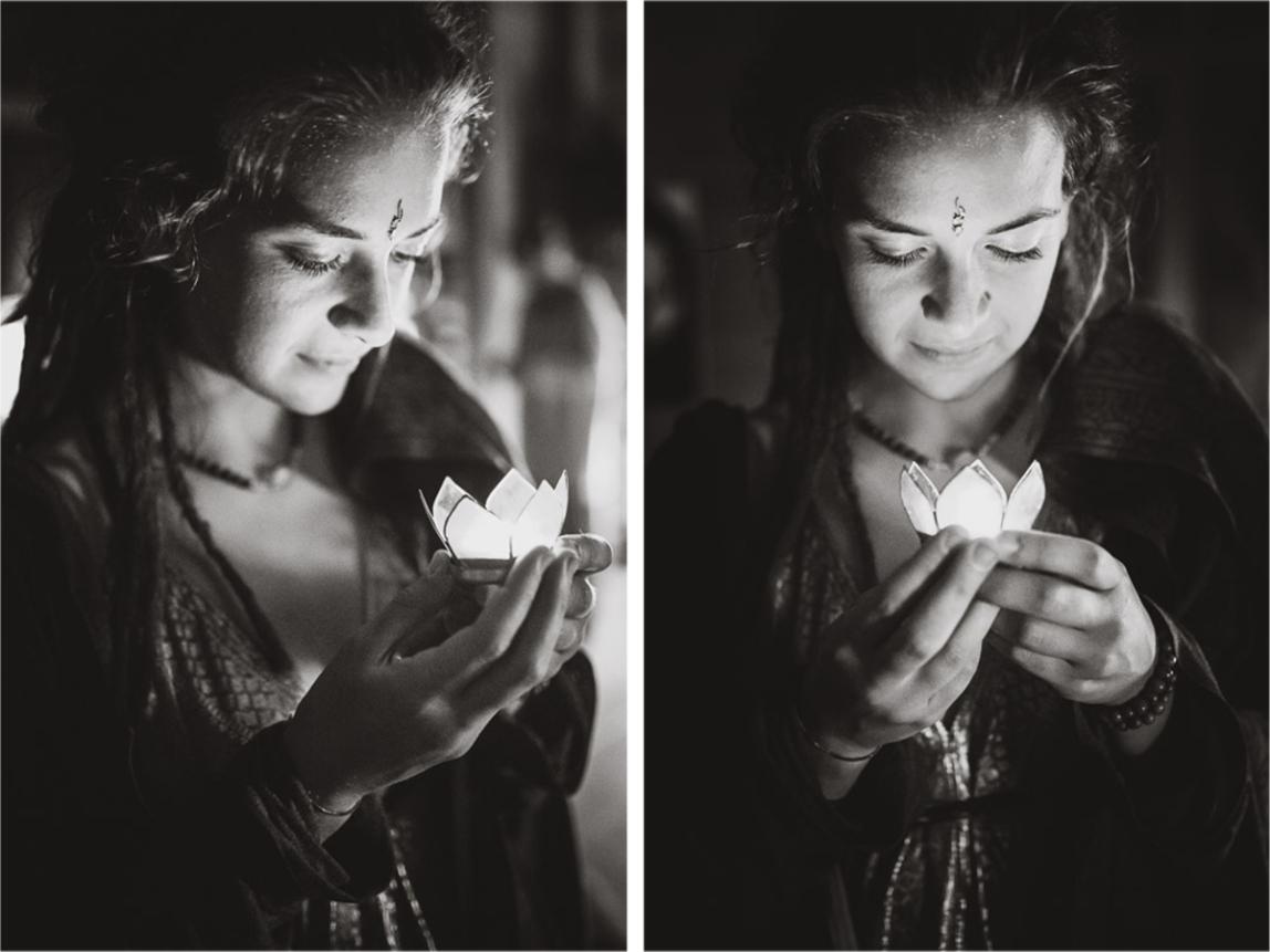 authentic portrait photos mallorca - black and white picture of a woman holding a lotus flower